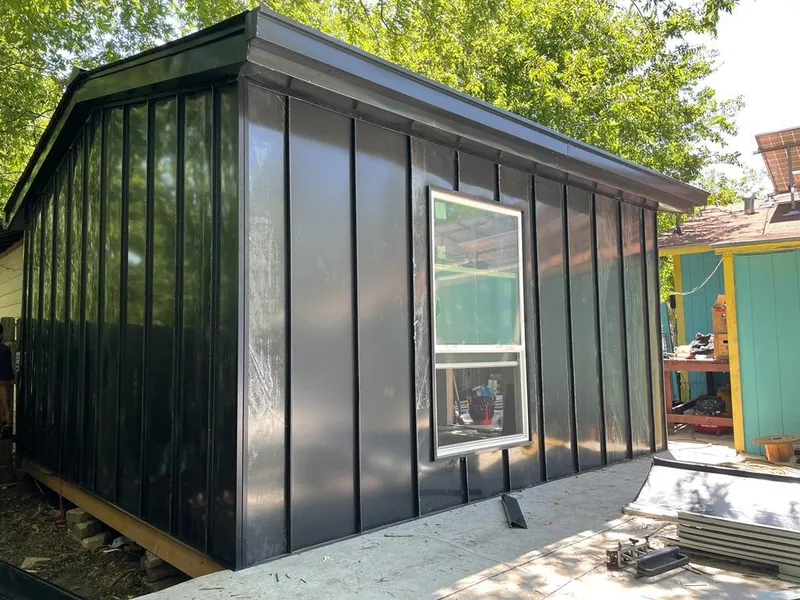 Black standing seam metal wall panels for Roof Inspection in Carbondale